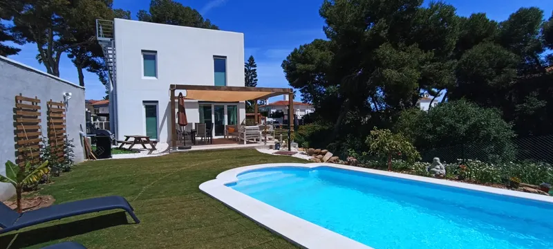Poolside Solarium with Sunbeds & Parasol