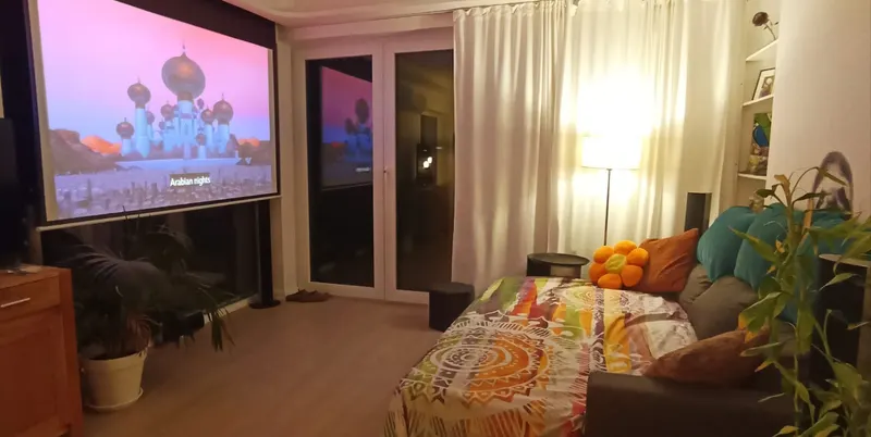 Home Cinema in Action: Large Projection Screen at Night